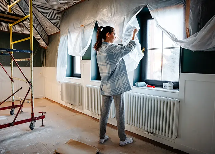 woman remodeling home